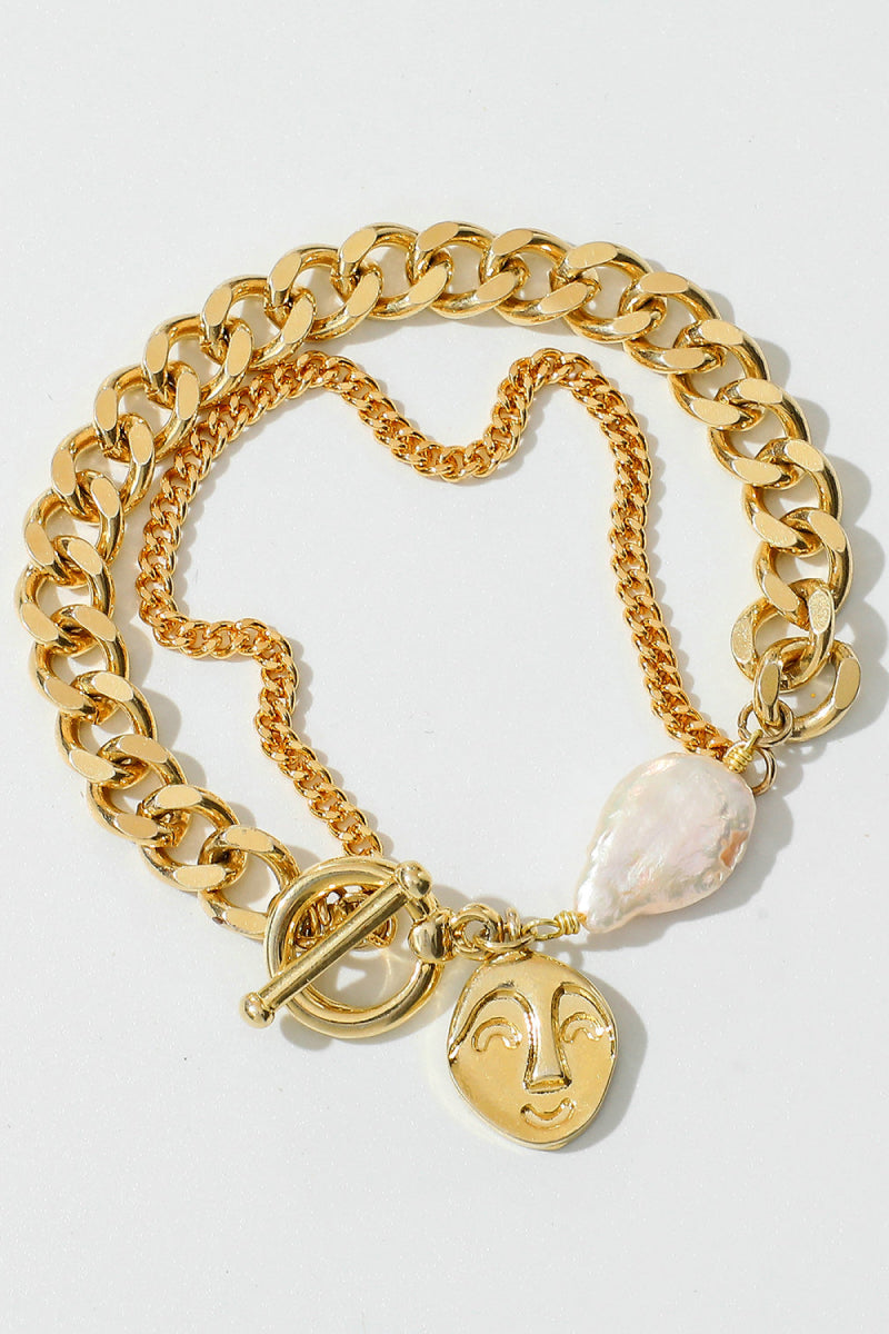 Pulsera de cadena de oro y perlas 